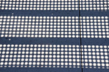 Light from the blinds on the roof of the house. Abstract backgroundの写真素材