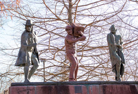 Sculptures of people in the park.の写真素材