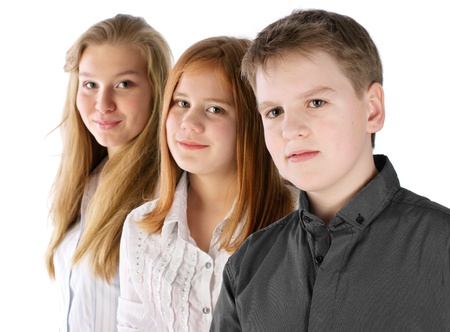 Boy and two girls stay in line and smilingの写真素材