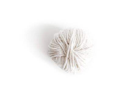 Ball of white yarn. Isolated skein of wool logo