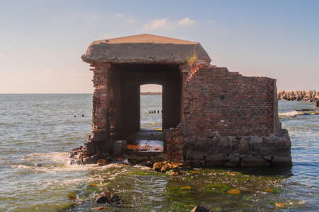 Ruins of a brick walls building. Old ruined fortress by the sea. Stock photo. Baltic Sea, Kaliningrad Region, Russia, The Vistula Spit.の写真素材