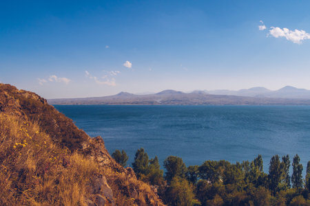 Beautiful picturesque autumn view of Sevan lake with blue water, Sevan, Armeniaの写真素材