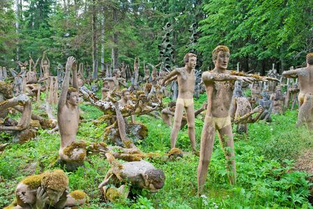 KOITSANLAHTI, PARIKKALA, FINLAND - JUNE 8, 2013: Patsaspuisto (Mystical forest). The sculptures of self-taught artist Veijo Ronkkonen (1944-2010) made of concrete and used false teeth from dentistsのeditorial素材