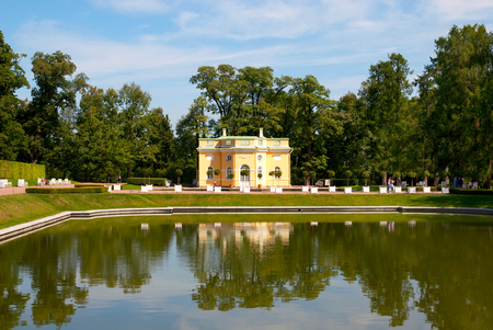TSARSKOYE SELO, SAINT-PETERSBURG, RUSSIA - JULY  30, 2013: The Upper Bathhouse Pavilion and Mirror Pond in Catherine Park. The Tsarskoye Selo is State Museum-Preserve and located near Saint-Petersburgのeditorial素材