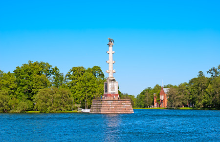 TSARSKOYE SELO SAINT PETERSBURG RUSSIA JUNE 2015: The Chesme Column on the Great Pond in the Catherine Park. Right side is Admiralty. The Tsarskoye Selo is State Museum Preserveのeditorial素材