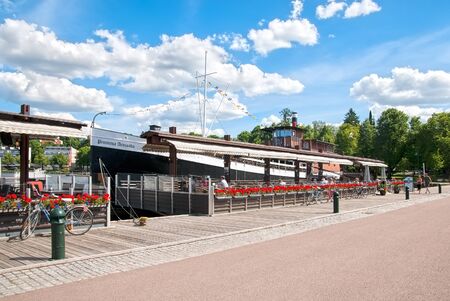 LAPPEENRANTA, FINLAND - JUNE 15, 2016: People in summer terrace of Prinsessa Armada floating restaurant on The Saimaa Lake embankmentのeditorial素材