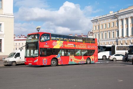SAINT-PETERSBURG, RUSSIA, APRIL 15, 2017: Hop-On Hop-Off. People in The City Tour Bus rides from the...