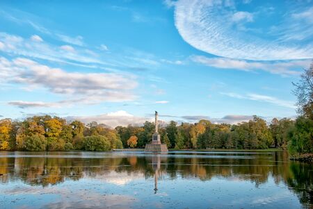 TSARSKOYE SELO, SAINT-PETERSBURG, RUSSIA - OCTOBER 7, 2017: Autumn view of The Chesme Column on the Great Pond in the Catherine Park. Was built by Antonio Rinaldi over 1774-1778のeditorial素材