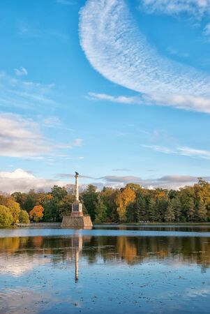 TSARSKOYE SELO, SAINT-PETERSBURG, RUSSIA - OCTOBER 7, 2017: Autumn view of The Chesme Column on the Great Pond in the Catherine Park. Was built by Antonio Rinaldi over 1774-1778のeditorial素材