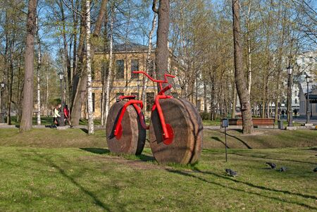 Bicycle with wheels from millstones. St Petersburg. Russiaのeditorial素材