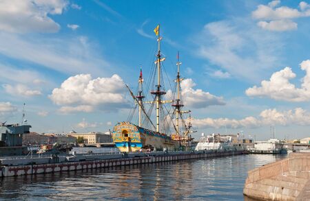 Saint-Petersburg, RussiaâJuly 7, 2019: People on excursion near Russian ship of the line Poltava built in 1712. Recreated model is a museum complexのeditorial素材