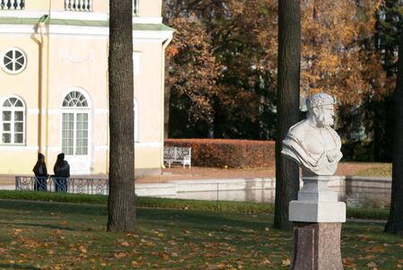 Tsarskoye Selo, Saint-Petersburg, Russia - October 15, 2019: Tourists are talking near The Upper Bathhouse Pavilion and The Mirror Pond in The Catherine Park. The State Museum Preserve Tsarskoye Seloのeditorial素材