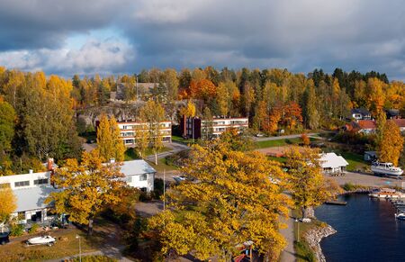 Puumala, FinlandâOctober 5, 2019: Top view of residential buildings and The Saimaa Lake in autumn. Puumala Municipality. Southern Savonia (Savo) Regionのeditorial素材