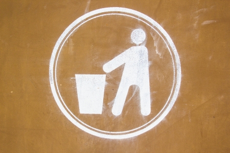 Dirty recycling sign in brown backgroundの写真素材