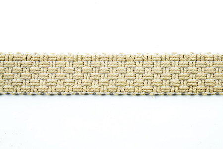Woven belt texture on white background