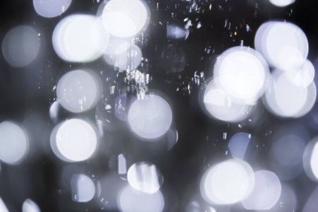 Silver bokeh of christmas lights background