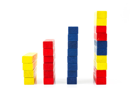 Red, Blue, Yellow wood toy as a statistical bars on white の写真素材