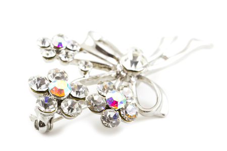 Diamond brooch on white の写真素材