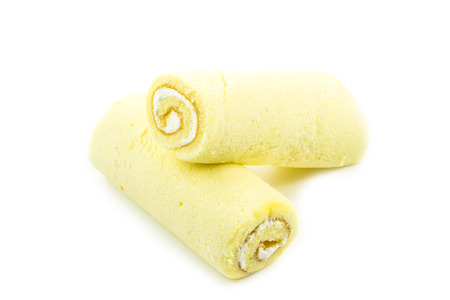 Jam roll cake with cream isolated on white の写真素材