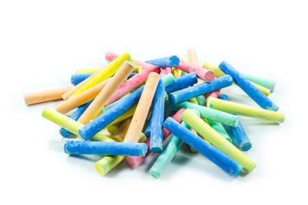 colored chalks on a white 