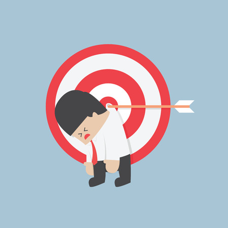 Businessman hanging on the target VECTORのイラスト素材