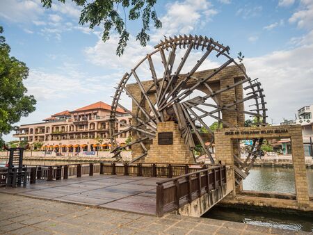 MALACCA, MALAYSIA - FEB 29: Old wooden windmill near the Melaka River on February 29, 2016 in Malacca, Malaysia.のeditorial素材