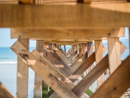 Under the old wooden bridge in Koh Kood island, Trat, Thailandの写真素材