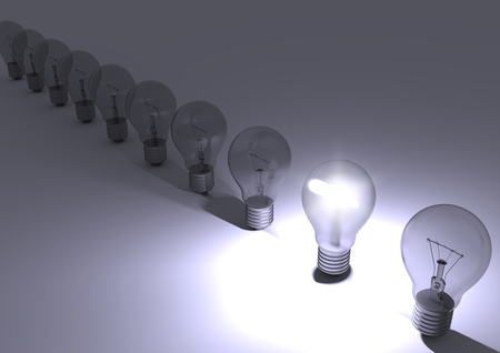 Group of incandescent light bulbs with one bulb illuminated. Idea concept. 3D render.の写真素材