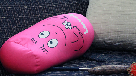 Pink happy pillow in my houseの写真素材