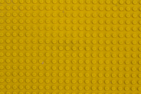 Texture of yellow dot plasticの写真素材