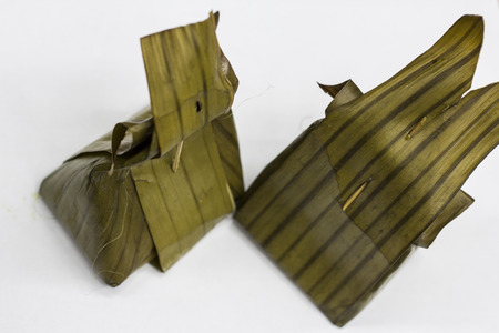 Thai custard wrapped by banana leafの写真素材