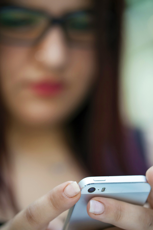 Young Girl with Her Cellphoneの写真素材