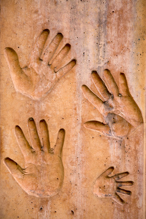 Abstract Cracked Hand Print on Wallの写真素材