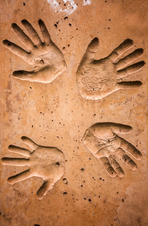 Abstract Cracked Hand Print on Wallの写真素材
