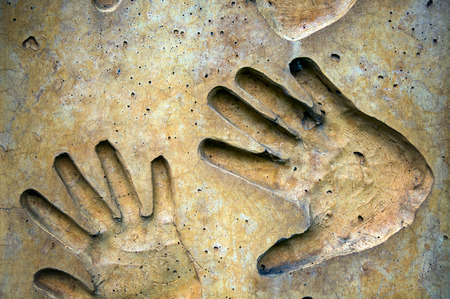 Abstract Cracked Hand Print on Wallの写真素材