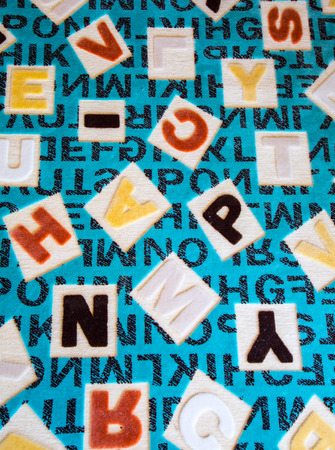 Alphabets on a Fabric Carpet Surfaceの写真素材