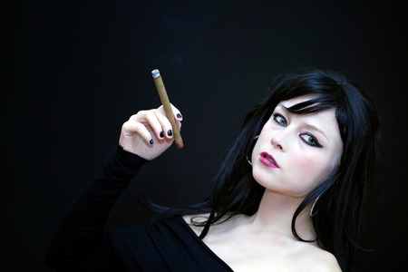 Young Woman Smoke Cigaretteの写真素材