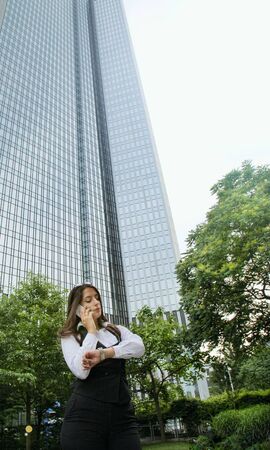 Beautiful Business Woman in City Outdoor Conceptの写真素材