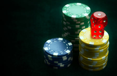 Gambling Red Dices and Money Chips Photoの写真素材