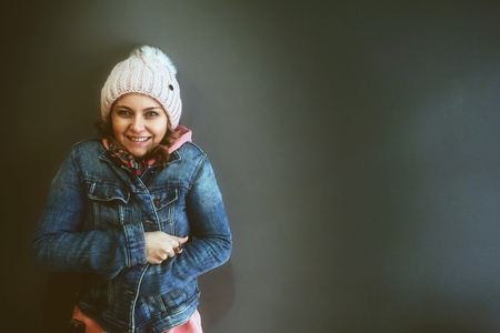 Young Woman Standing and Smiling
