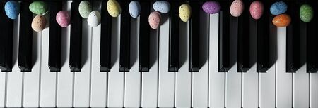 Colorful Paschal Easter Eggs and Piano Keys