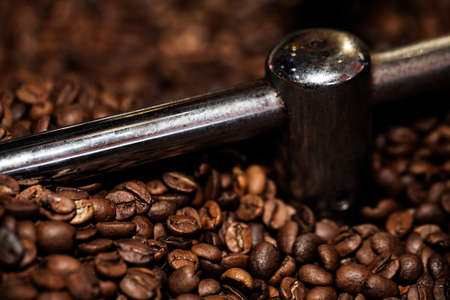 Fresh Raw Roasted Coffee Beans close Up