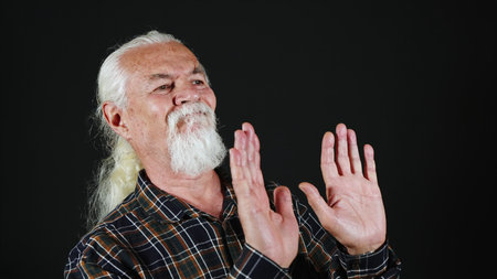 The man states with his hands that he absolutely does not want anythingの写真素材