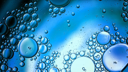 Abstract Colorful Food Oil Drops Bubbles and spheres Flowing on Water Surface, macro Photography