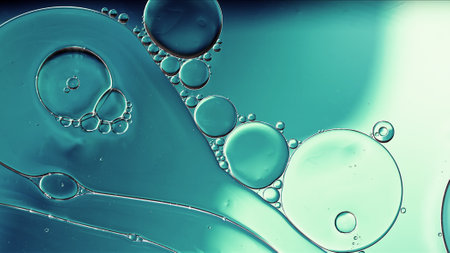 Abstract Colorful Food Oil Drops Bubbles and spheres Flowing on Water Surface, macro Photography