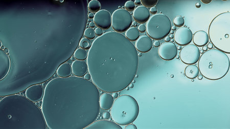 Abstract Colorful Food Oil Drops Bubbles and spheres Flowing on Water Surface, macro Photography