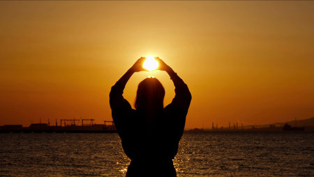 Young Woman Silhouette in Sunset Dreamy Light