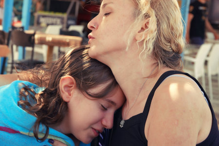 A Family Mother and Daughter Hug with Love