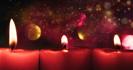 Romantic Red Candle Light and Colorful Bokeh Behindの写真素材