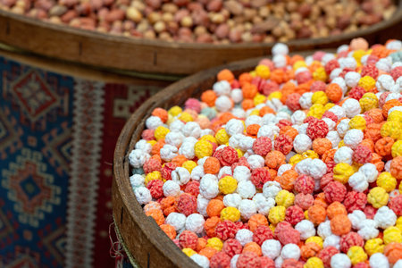 Colorful Round Candies in a Basketの写真素材